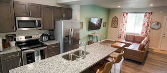 Central 3/2, garage, private yard, walk to arena, EV charger