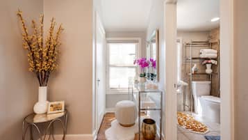 Combined shower/bathtub, hair dryer, towels, soap