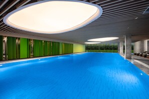 Indoor pool, pool loungers, lifeguards on site