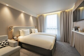 Luxe beddengoed, individueel gemeubileerd, een bureau