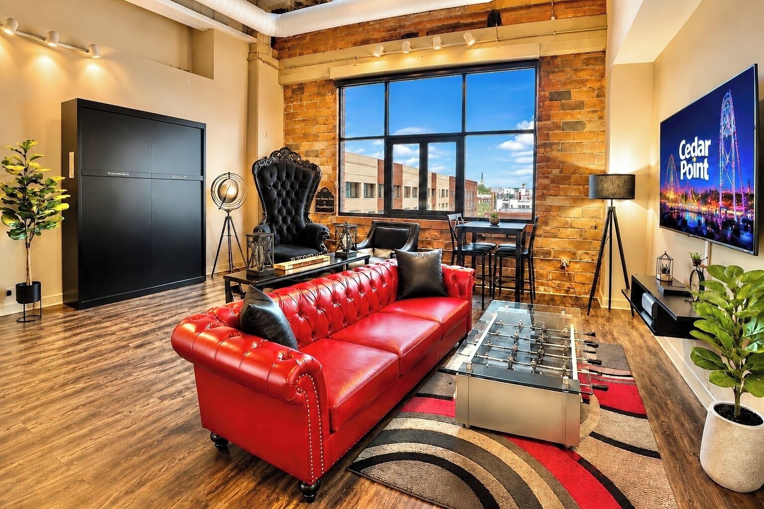 Open-concept living area with cozy seating, modern finishes, and plenty of space to unwind. Ideal for groups to relax and enjoy time together.
