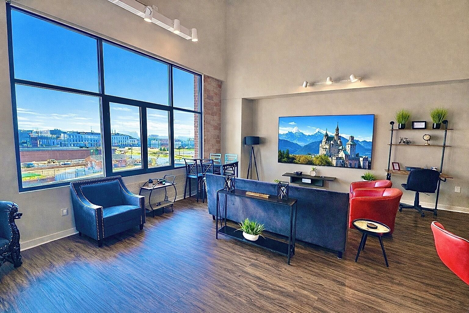 Open-concept living area with cozy seating, modern finishes, and plenty of space to unwind. Ideal for groups to relax and enjoy time together.