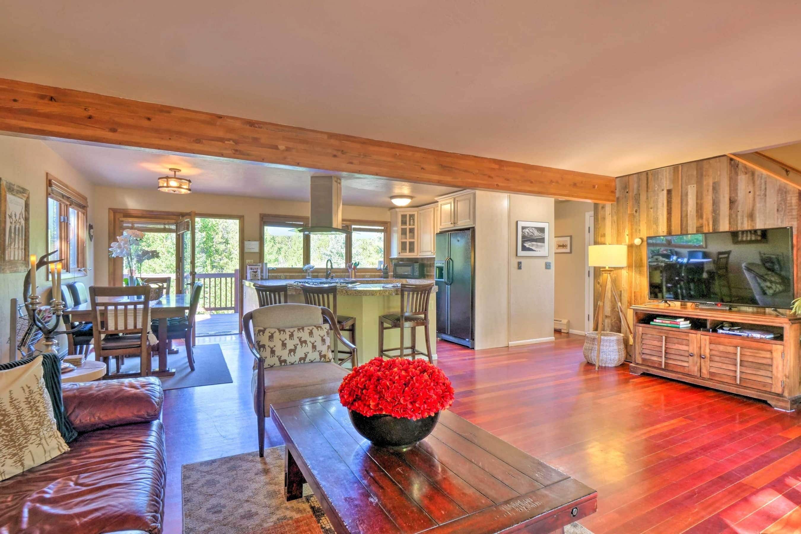 Smart TV, fireplace, books, computer monitors