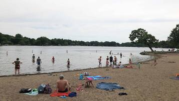 Guests can enjoy a serene lakeside beach experience with access to the water.