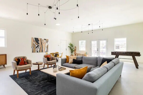 Smart TV, fireplace, table football, books