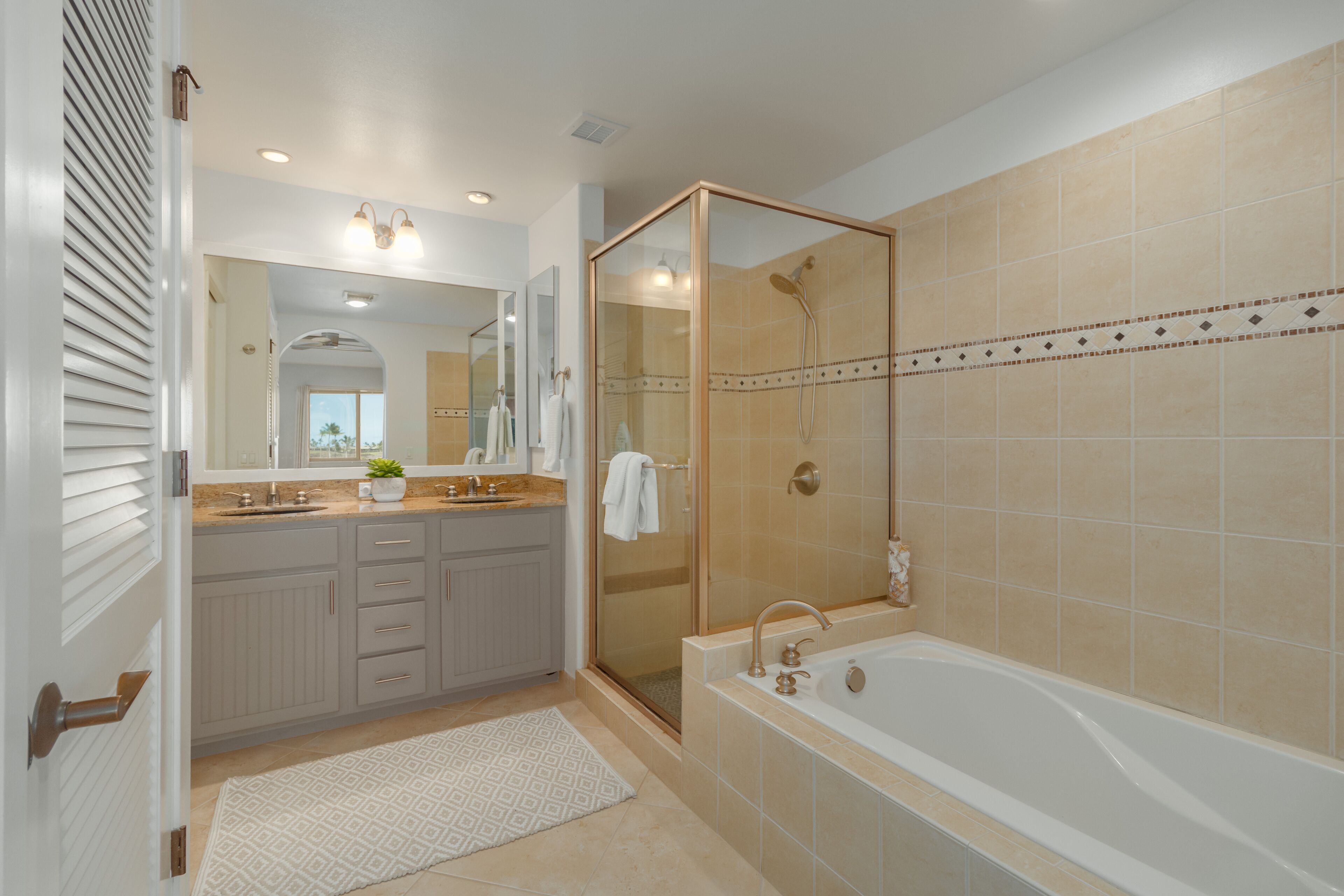 Combined shower/tub, hair dryer, towels, soap