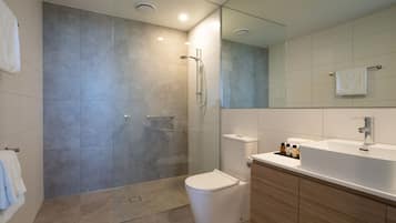 Shower, rainfall showerhead, designer toiletries, hair dryer
