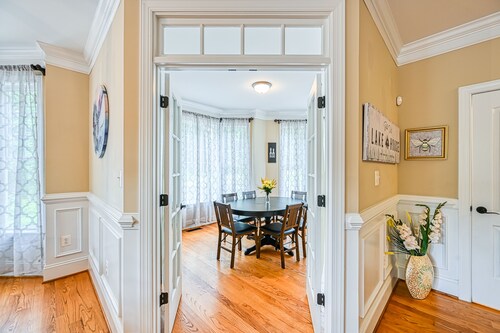 Lakefront home with private beach, dock, deck, kayaks, game room, & fireplace