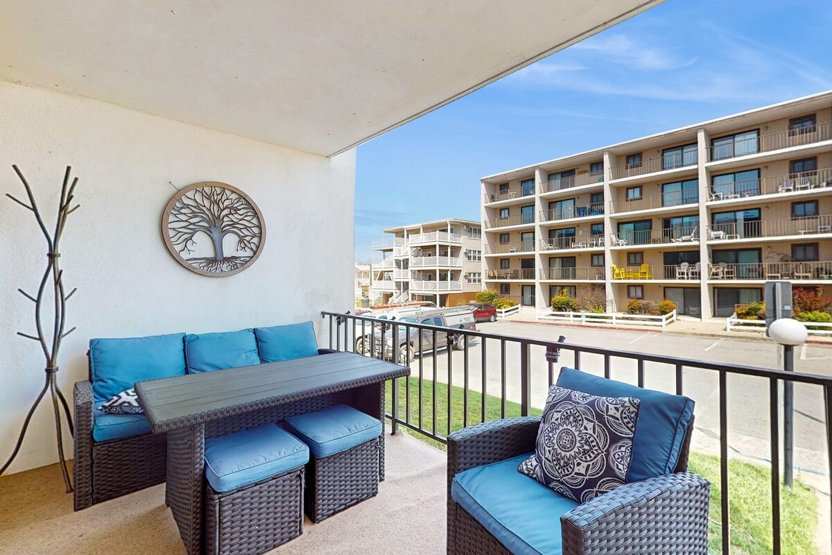 Dog-friendly 1st-floor end condo with beach entrance view - steps to the beach