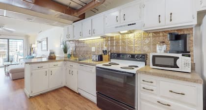 Dog-friendly 1st-floor end condo with beach entrance view - steps to the beach