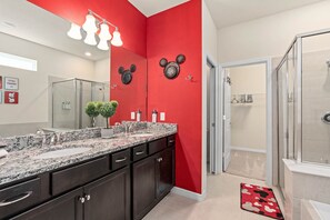 Combined shower/tub, hair dryer, towels, soap