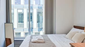 1 bedroom, desk, iron/ironing board, travel cot