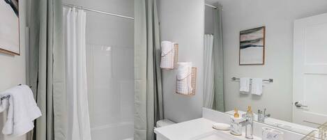 Shower, hair dryer, towels