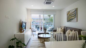 Luxury Apartment | Living area | 43-inch Smart TV with digital channels, TV