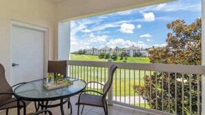 Condo, Multiple Beds, Balcony, Golf View (Fun in the Sun in Reunion) | Outdoor dining - Fun In The Sun in Reunion (Kissimmee)