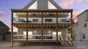 A two-story building with a balcony, outdoor lighting, and a sign reading 'INGALLVIEW'. - Ingallview at Branson Cove - Indoor Pool (Hollister)