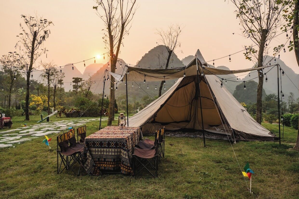 Comfort Tent | In-room safe, individually decorated, individually furnished, desk