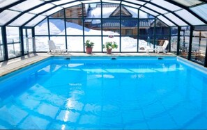 Alberca techada y alberca climatizada