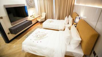 Suite Premium, 2 kamar tidur | Brankas, meja kerja, setrika/meja setrika, dan Wi-Fi gratis