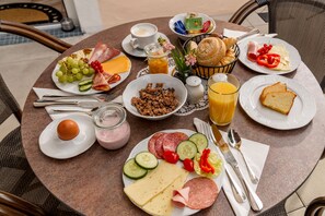 Daily buffet breakfast (EUR 18 per person)