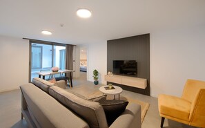 Condo | Living area | 140-cm flat-screen TV with satellite channels, TV - Lodos Suites & Residence (Bodrum)