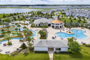 A resort with multiple swimming pools, a golf course, and a large building with a dome roof. - Last Minute Disney! Private Pool, Hot Tub, Game Room & Themed Bedrooms. Book Now! #29466 (Orlando)