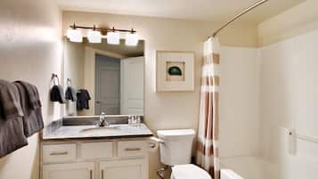 Bathtub, hair dryer, towels