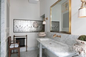 Bathtub, hair dryer, towels, soap