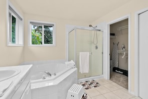 Combined shower/bathtub, hair dryer, towels, soap