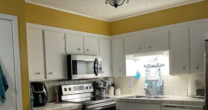 Charming water front cottage on Cane River with stunning sunroom & private decks