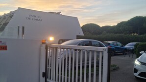A gated entrance to a building with a sign reading "VASCO DE GAMA". - Very nice T2 40m2 + 45m2 terrace (La Grande-Motte)