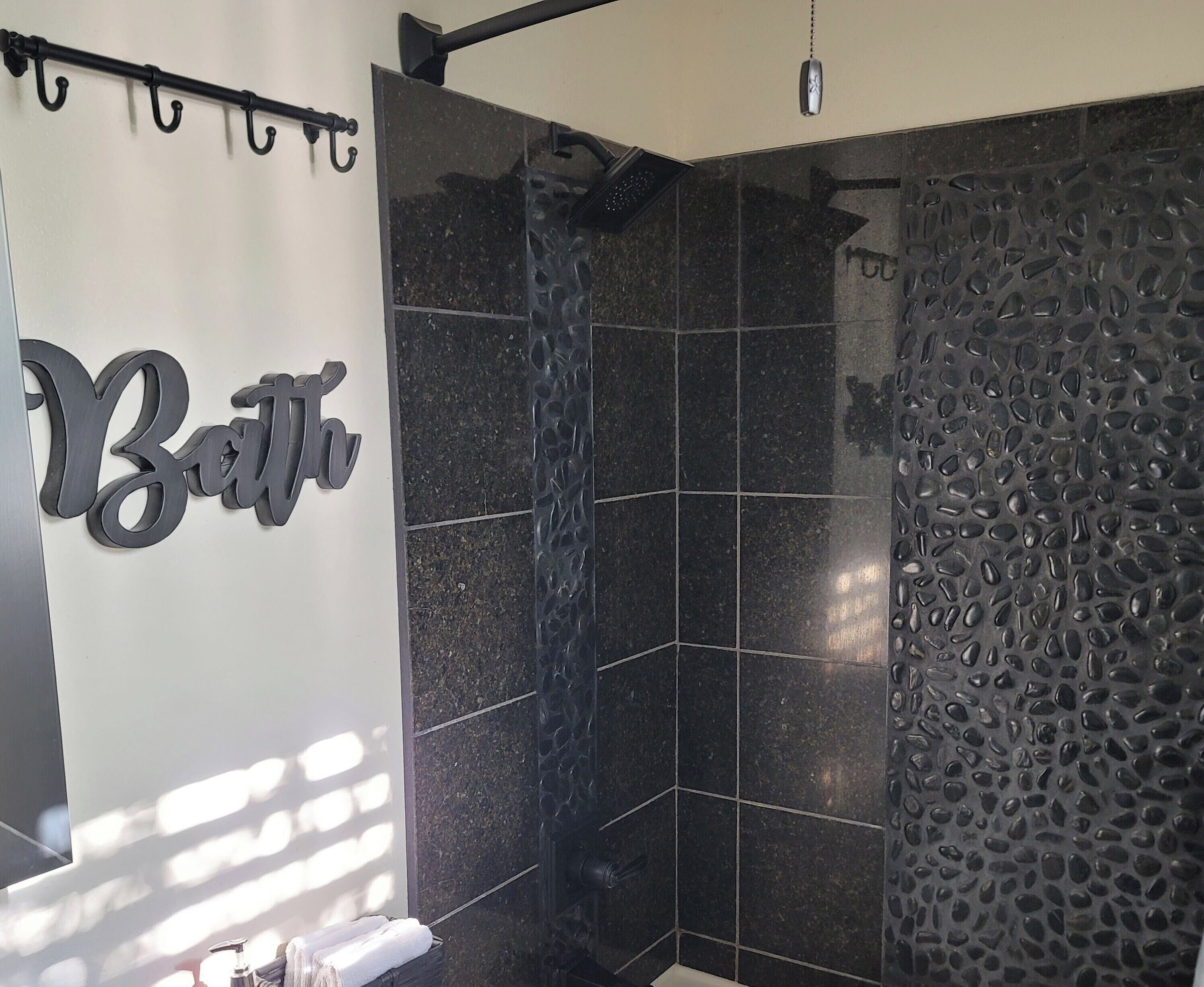 Combined shower/tub, hair dryer, towels, soap