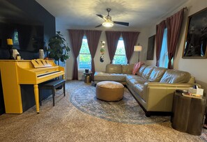 Smart TV, fireplace, books, printers