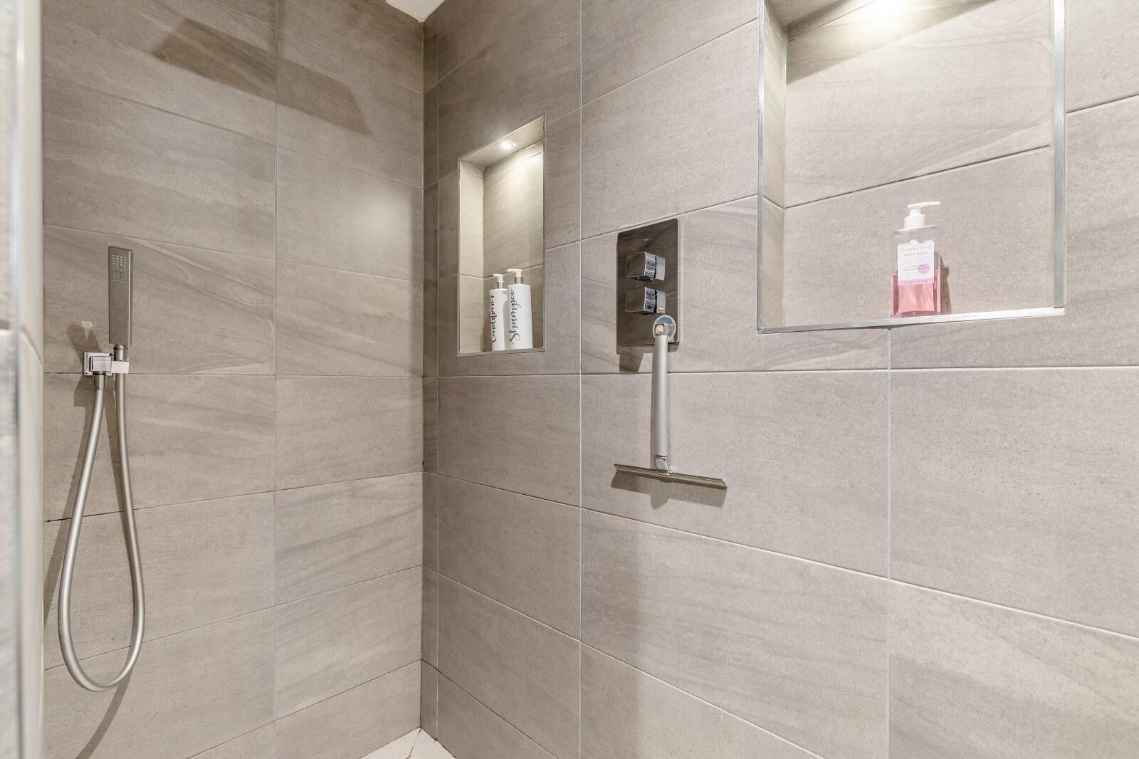 Shower, hair dryer, towels
