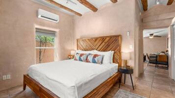 1 bedroom, desk, iron/ironing board, travel crib