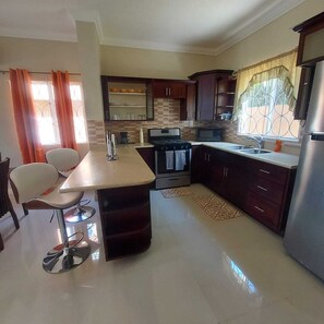 Fridge, microwave, oven, stovetop - Tropical Luxury 2 bedroom Jamaican townhouse (Ocho Rios)