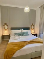 Family Apartment | 2 bedrooms, down comforters, laptop workspace, iron/ironing board
