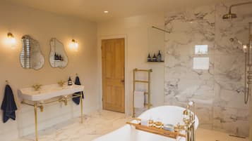 Separate bathtub and shower, deep-soaking bathtub, hair dryer, towels