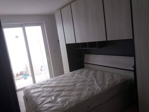 Apartamento | 2 quartos, ferros/tábuas de passar roupa, Wi-Fi de cortesia