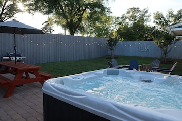 Six Person Hot Tub in the backyard