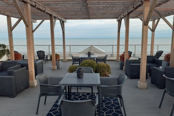 Shared rooftop patio to BBQ and dine. What a view! Almost 360 degree viewing.