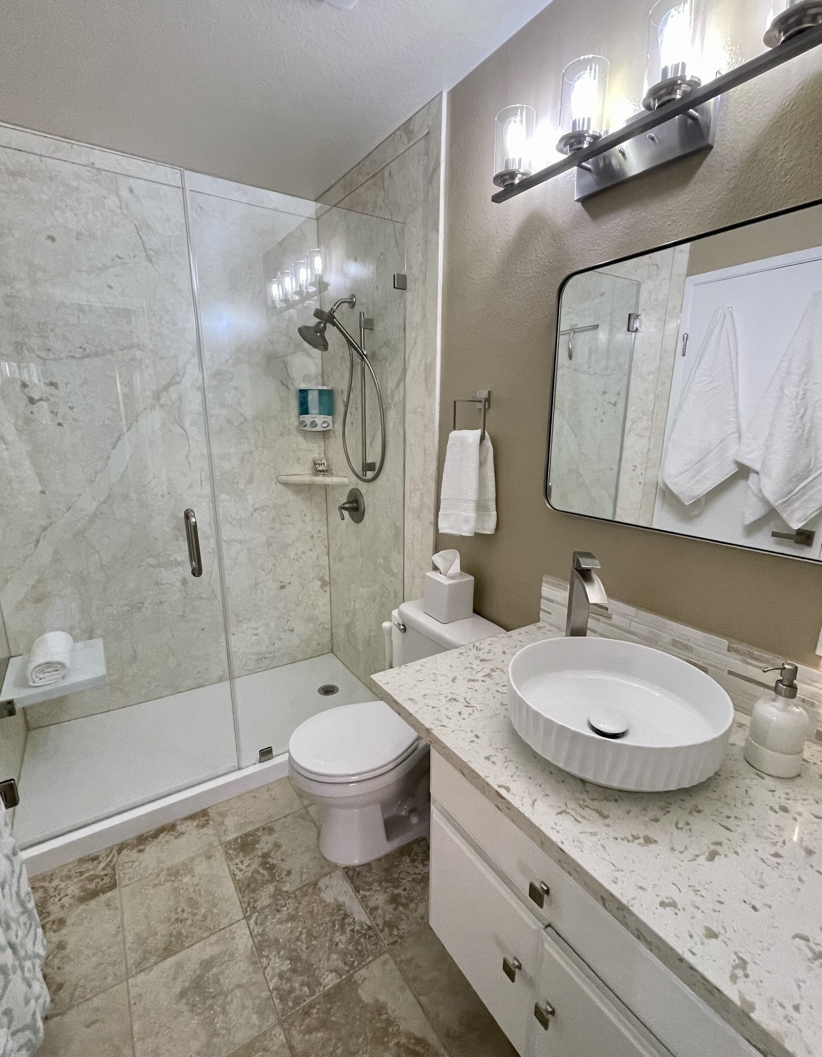 Shower, eco-friendly toiletries, hair dryer, towels