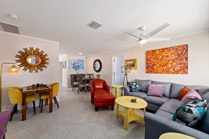 Smart TV, fireplace, books, printers