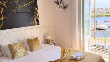 Ave Balcony Room | Individually decorated, blackout drapes, iron/ironing board, free WiFi