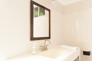 Standard Studio Suite | Bathroom | Shower, towels, soap, toilet paper