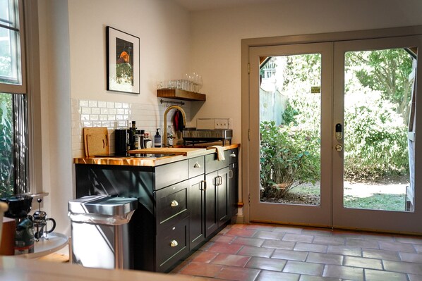 Fridge, microwave, stovetop, coffee/tea maker