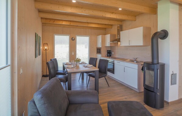 Enjoy meals in the kitchen with a stove and dining area for two.