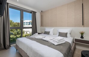 3 chambres, coffre-fort, fer et planche à repasser, lit de bébé portatif
