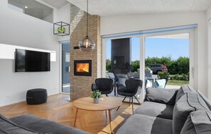 Fernseher, Kamin