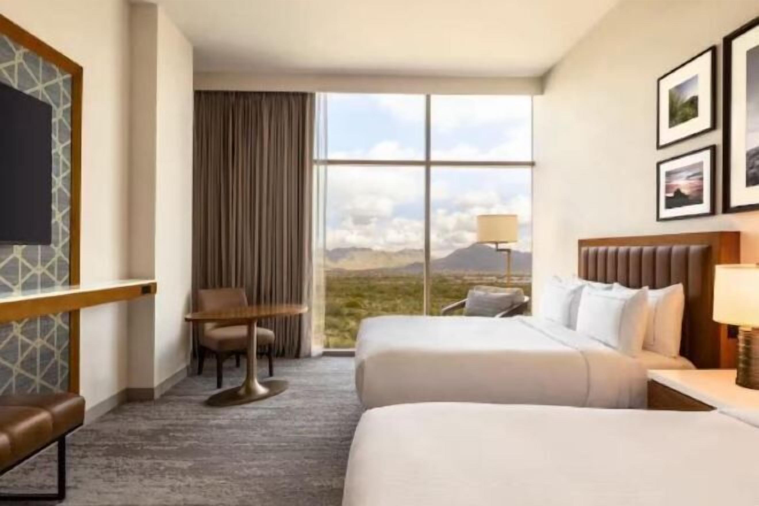 In-room safe, laptop workspace, blackout drapes, soundproofing